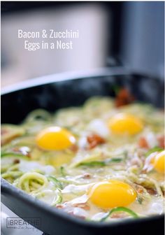 an egg dish in a skillet with zucchini noodles and eggs on top