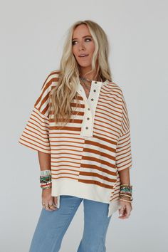 Perfect for any occasion, from casual outings to weekend getaways, our City Stripes High Low Top pairs effortlessly with your favorite denim or skirts for a boho - chic style! You'll love this unique and laid - back top because it features: Comfortable solid Cotton fabric with mixed striped color block design throughout Loose and oversized pullover top silhouette Dropped shoulders with loose short sleeves Classic collared neckline with an oversized Henley button - up front closure Slight high - Oversize Pullover, Loose Clothing, Bandeau Tops, Pull Oversize, Three Birds, Patchwork Top, Printed Wide Leg Pants, Stripe Fabric, Cotton Clothing