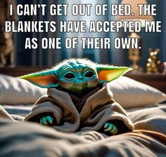 a baby yoda sitting on top of a bed with the caption, i can't get out of bed the blankets have accepted me as one of their own