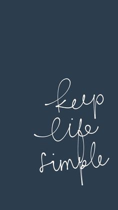 the words keep life simple written in white on a dark blue background with a handwritten font