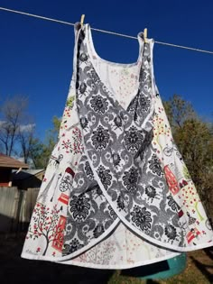 a dress hanging from a clothes line with the words pdf download pattern on it