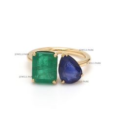 Emerald and Blue sapphire two stone ring gold | Natural emerald and sapphire toi et moi ring gold | Emerald cut emerald pear sapphire gold STONE DETAILS : ✦ Stone: Emerald | Blue Sapphire  ✦ Stone Type : Natural ✦ Stone Size : 10x8mm/ 10x7mm ✦ Stone Shape : Emerald cut / Pear cut ✦ Number of stones :2 ✦ Stone Weight : 3-4 carats/2-3carats ✦ Stone Grade : AAAA METAL DETAILS : ✦ Metal : 14K/18K Gold ✦ Metal Color : Yellow / White / Rose Gold ✦ Setting : Flush Setting ✦ Ring Box : Yes SHIPPING DETAILS : ✦ Production time : 10-12 days ✦ Delivery time : 7-8 days ✦ Expedited shipping : Available ✦ Expedited shipping service : UPS ✦ Expedited shipping time : 5 days ✦ Expedited shipping cost : 70$ CUSTOMISATION DETAILS : We can customize any piece of fine jewelry. You can simply message us on Etsy Sapphire And Peridot Ring, Sapphire And Emerald Ring, Emerald And Sapphire Ring, Jewelry Redesign, Flush Setting, Two Stone Ring, Smaragd Ring, Emerald Ring Vintage, Art Jewelry Design