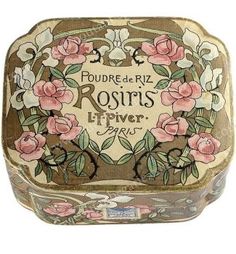 an old fashioned box with flowers painted on the front and sides, sitting in a white background