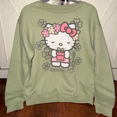 Bnwt Hello Kitty Olive Sweatshirt In Size Small Features Hello Kitty Gardening With A Potted Plant And Flowers All Around Her! Experienced Shipper With The Reviews To Show It! Shipped With Love And Care As Well As Tons Of Bubblewrap Tiktok Famous And Very Hard To Find After Going Viral Trending Hello Kitty Blankets Hello Kitty Throws Valentines Easter Hello Kitty Pinkmas Home Goods Tj Maxx Rae Dunn Cupcakes And Cashmere Throw Tiktok Viral Holiday Present Gift Gingerbread Love Xoxo Valentines Rae Spring Kawaii Sweatshirt With Cartoon Print, Spring Kawaii Cartoon Print Sweatshirt, Hello Kitty Cotton Sweatshirt In Kawaii Style, Cute Cotton Sweatshirt With Hello Kitty Print, Cute Hello Kitty Print Crew Neck Sweatshirt, Hello Kitty Print Crew Neck Cotton Sweatshirt, Cotton Crew Neck Sweatshirt With Hello Kitty Print, Casual Long Sleeve Hello Kitty T-shirt, Casual Long Sleeve T-shirt With Hello Kitty Print