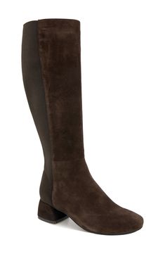 A stretchy back panel offers a comfortable fit on a knee-high boot grounded by a cushioned footbed and durable rubber sole. 1 3/4" heel 15 1/4" shaft; 9 1/4" calf circumference. Narrow calf Side zip closure Memory foam cushioning PORON®-cushioned insole with arch support Leather upper and lining/rubber sole Imported Narrow Calf Boots, Chocolate Brown Boots, Mens Shoes Black, Chocolate Leather, Sneaker Dress Shoes, Boot Brands, Maternity Shops, Tall Boots, Kenneth Cole