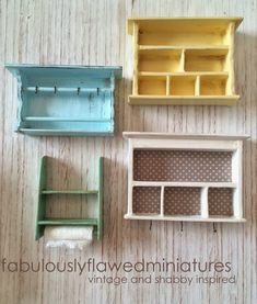 four different types of miniature shelves on a table