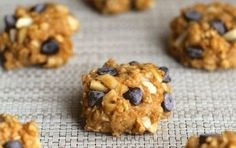 cookies with chocolate chips and oats on a baking sheet