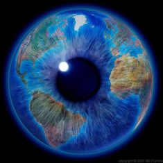 an eyeball with the earth in it's center, showing blue and green colors