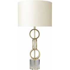 a table lamp with a white shade on the top and a gold metal frame around it