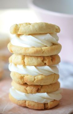 a stack of cookies with white frosting on top