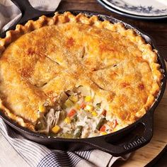 a chicken pot pie in a cast iron skillet