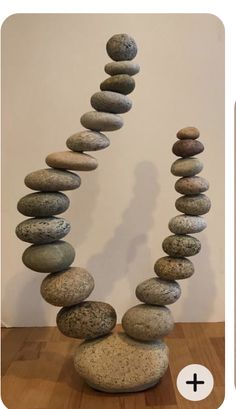 a stack of rocks sitting on top of a wooden table