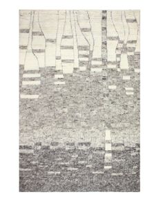 an area rug with trees and water in grey tones on the floor, it is made out of woven fabric