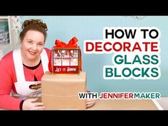 a woman is holding a box with some decorations on it and the words how to decorate glass blocks