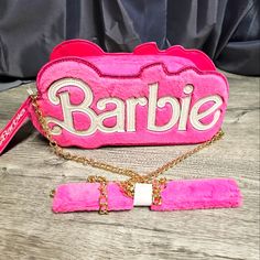 Nwt Barbie Logo Fuzzy Mini Crossbody Bag Product Id: 20835102 Barbie Logo Fuzzy Mini Crossbody Bag Hot Pink Bag Features A Fuzzy Barbie Logo And Comes With A Heart Shaped "B" Embossed Zipoer Pull. The Gold Tone Chain Comes With Fuzzy Pink Shoulder Padding . 10"3"5" . Polyester, Polyurethane . Zipper Charm . Imported Barbie Purse, Hot Pink Bag, Bday Wishlist, Barbie Logo, Barbie Core, Zipper Charms, Pink Vibes, Barbie Friends, Mini Crossbody Bag