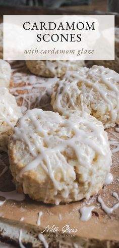 homemade cardamom scones with cinnamon glaze on a cutting board and text overlay