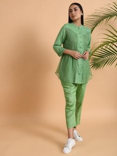 A cotton dobby & kota shirt with front placket, 3/4th sleeves, comes with a soft cotton matching slip Garment measurements (in Inches): Size XS : Bust-34", Waist-36", Hip-Flared Size S : Bust-36", Waist-38", Hip-Flared Size M : Bust-38", Waist-40", Hip-Flared Size L : Bust-40", Waist-42", Hip-Flared Size XL : Bust-42", Waist-44", Hip-Flared Size XXL : Bust-44", Waist-46", Hip-Flared Size 3XL : Bust-46", Waist-48", Hip-Flared Size 4XL : Bust-48", Waist-50", Hip-Flared Length: 30-32", sleeve l Summer Cotton Blouse With Set-in Sleeves, Summer Cotton Kurta With Set-in Sleeves, Casual Cotton Kurta With Placket, Festive Long Sleeve Cotton Shirt, Daywear Half Sleeve Cotton Shirt, Cotton Half Sleeve Shirt For Daywear, Cotton Half Sleeve Daywear Shirt, Summer Sets With 3/4 Sleeve, Casual Cotton Kurta With Half Sleeves