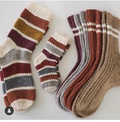 three pairs of socks sitting next to each other