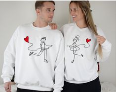 "Heart Balloon Couple Valentines Sweatshirt, Cute Matching Couples Sweater, Couple Matching Hoodie, Heart Love Couple Sweater, Valentine Gift ☀️☀️☀️☀️☀️ Everything in our shop is hand crafted and made to order. If you want different color or size contact me! If you would like something custom made to fit your personal style please message me and I will do everything to get you that something special. ---How To Order--- ⭐️Please, check and review all photos ⭐️Choose your t-shirt size and color ⭐️Enter your Design Color Example: \"White\" ⭐️Click add to cart. You can go back to add more product ⭐️Click \"Proceed to check out\" ⭐️When you check out, you can add a note to seller for any request *High quality and super soft, comfortable shirt. Made with top of the line vinyl and pressed with a Couples Emoji, Couples Matching Sweaters, Sweater Couple, Valentines Sweatshirt, Couple Hoodies, Love Balloon, Cute Matching