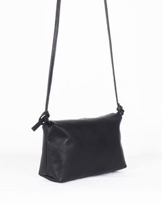 Small black leather crossbody bag, minimalist small purse, Handmade small leather bag, black small purse women, small shoulder bag The Harmony collection is designed looking for the perfect fusion between Beauty and Functionality. With highly studied patterns, the leather accessories in this collection breathe Harmony and minimalism. The small shoulder bag is designed to comfortably carry what you need. This small leather cross body bag is handmade by Mon in the small atelier Nubuckcuir Handmade Minimalist Crossbody Shoulder Bag With Removable Pouch, Minimalist Clutch Shoulder Bag With Detachable Strap, Minimalist Evening Shoulder Bag With Adjustable Strap, Minimalist Leather Shoulder Bag With Adjustable Strap, Minimalist Crossbody Shoulder Bag With Adjustable Strap, Minimalist Black Shoulder Bag With Mobile Phone Holder, Minimalist Soft Leather Clutch Shoulder Bag, Minimalist Soft Leather Evening Shoulder Bag, Minimalist Leather Crossbody Shoulder Bag