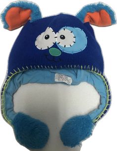 a blue hat with ears and eyes on it