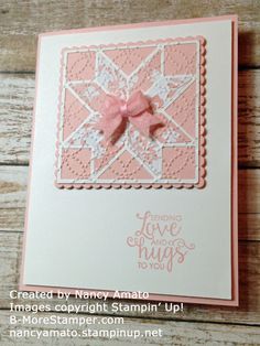 a card with a pink bow on it