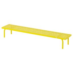 a yellow bench sitting on top of a white floor