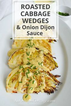 roasted cabbage wedges and onion dijon sauce on a white plate with text overlay