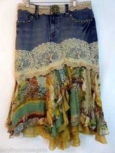 a skirt hanging up on a clothes hanger with lace trimming around the bottom