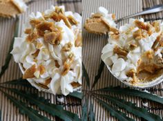 there is a desert with nuts and cream in it on the table next to some palm leaves