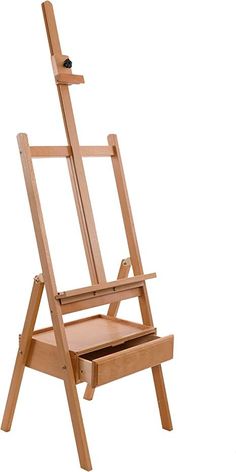 a wooden easel with drawers on the bottom