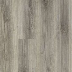 an image of wood flooring that looks like it has been painted in light grey