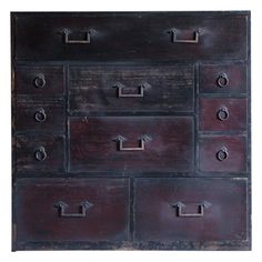 an old wooden dresser with many drawers