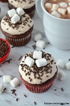 cupcakes with marshmallows and chocolate sprinkles