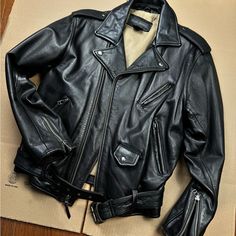 Early 2000s Banana Republic Cafe Racer Style Genuine Leather Jacket. Satin Sleeve Liners. Perfect Condition. Very Slight Pigment Wear On Sleeve But Adds Great Character. Pit To Pit: 21.5" Shoulder To Shoulder: 19" Sleeve Length 23". Length: 23". Waist: 17". Bust: 20".All Buttons And Zipper Work Perfectly. Thanks For Looking! Cafe Racer Style, Genuine Leather Jackets, Early 2000s, Black Tan, Cafe Racer, Black And Tan, Bananas, Banana Republic, Genuine Leather