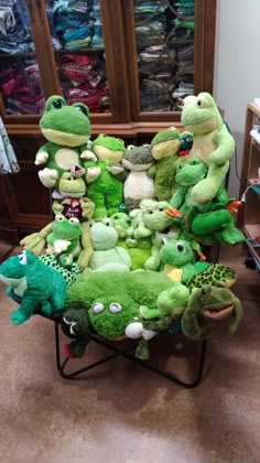 a chair with stuffed animals on it in a room