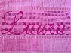 a pink towel with the word mama written on it