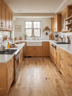 a kitchen filled with lots of wooden cabinets and white counter top space next to a stove top oven