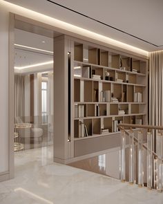 a large book shelf in the middle of a room with marble floors and white walls