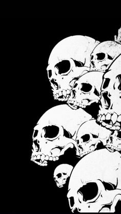 a bunch of skulls sitting on top of each other