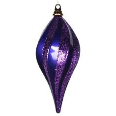 a purple ornament hanging on a white background