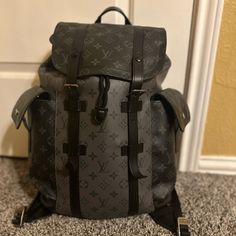 Men’s Christopher Backpack Hardly Used Microchipped Designer Satchel Backpack With Large Capacity, Designer Large Capacity Satchel Backpack, High-end Large Capacity Travel Backpack, Luxury Large Capacity Backpack For Errands, Luxury Large Capacity Shoulder Backpack, Designer Leather Backpack With Large Capacity, Luxury Coated Canvas Backpack With Large Capacity, Luxury Coated Canvas Backpack For Everyday, Luxury Large Capacity Coated Canvas Backpack