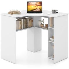 a computer desk with a laptop on top of it and bookshelves below the desk