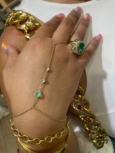 Made with solid 14K yellow gold, and natural Colombian emerald and diamonds. One size fits most, please inquire with you middle finger ring size and wrist side to confirm.  Custom adjustments provided Finger Wrist Bracelet, Finger To Wrist Bracelet, Ring And Bracelet Connected, Chain Ring Bracelet, Gold Hand Chain, Maximalist Jewelry, Finger Bracelets, Middle Finger Ring, Hand Chain Bracelet