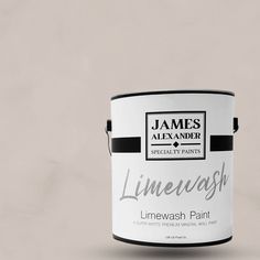 a white paint can with the words limewash painted on it's bottom half