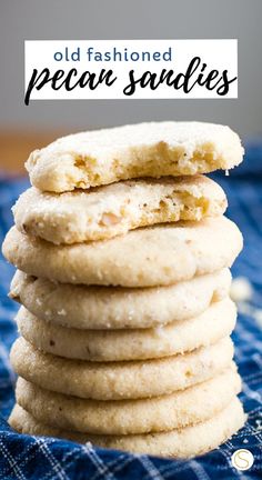 a stack of cookies sitting on top of a blue cloth