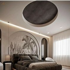 a large bed sitting in the middle of a bedroom next to a round mirror on the wall