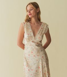 In a swingy silk-satin, the ‘30s-inspired Tahlia Dress—one of our co-founder Katherine’s favorites—features a plunging V-neckline and surplice back trimmed with petite ruffles. A fitted bodice with an adjustable back waist tie gives way to an ankle-grazing bias-cut skirt, while a snap closure allows you to adjust the neckline. Flowy Summer Dresses, Bias Cut Skirt, Casual Day Dresses, Floral Lace Dress, Mini Dress Casual, Vintage Inspired Dresses, Silk Midi Dress, Shop Maxi Dresses, Types Of Dresses