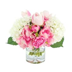 a vase filled with pink and white flowers