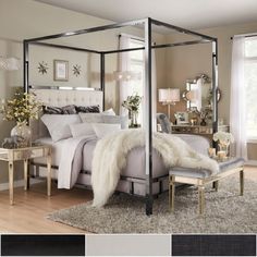 a four poster bed with white fur on it